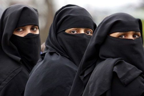 women in burqas
